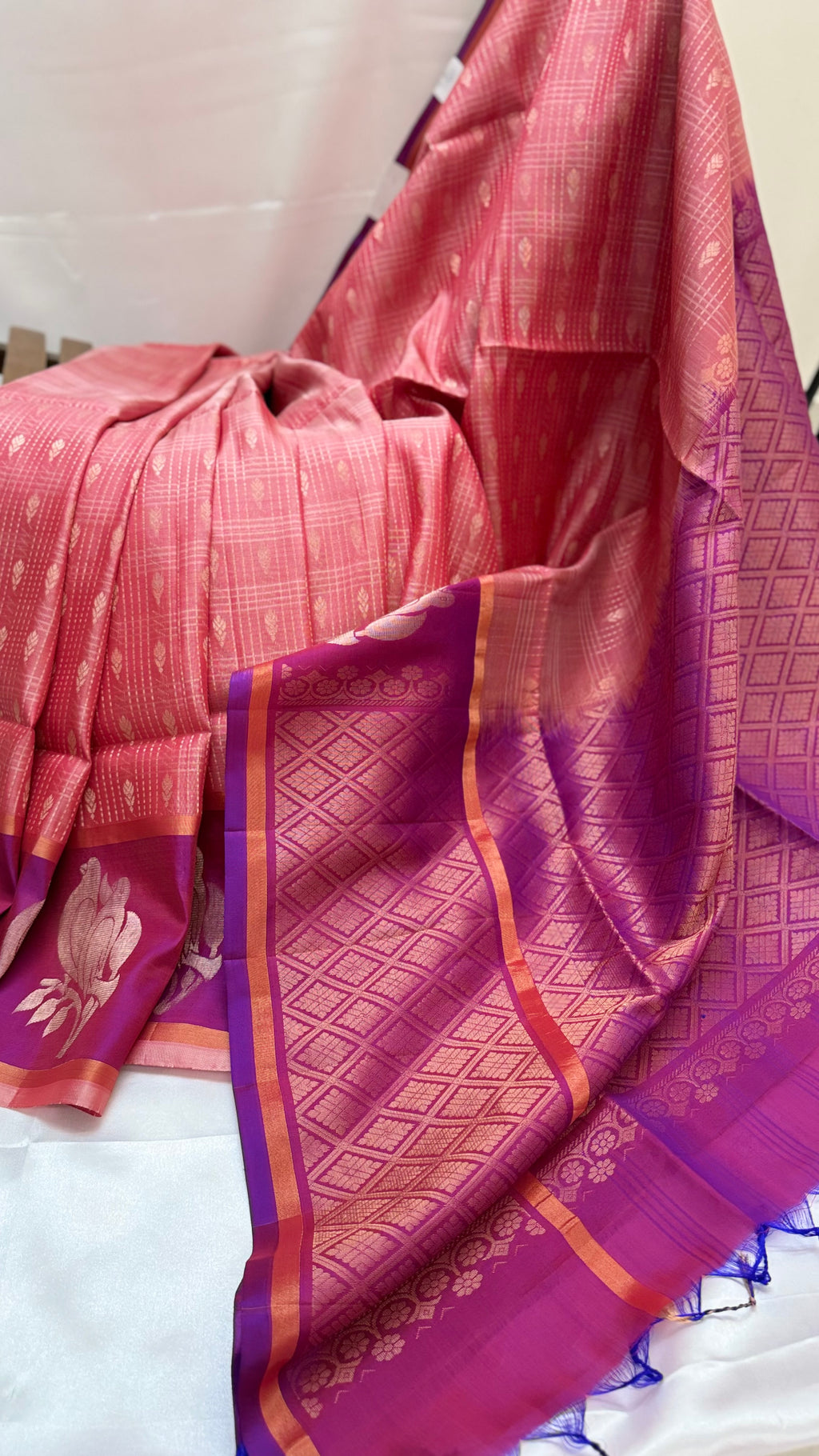 Kanchi Pattu Saree with Peach colour body and Purple border