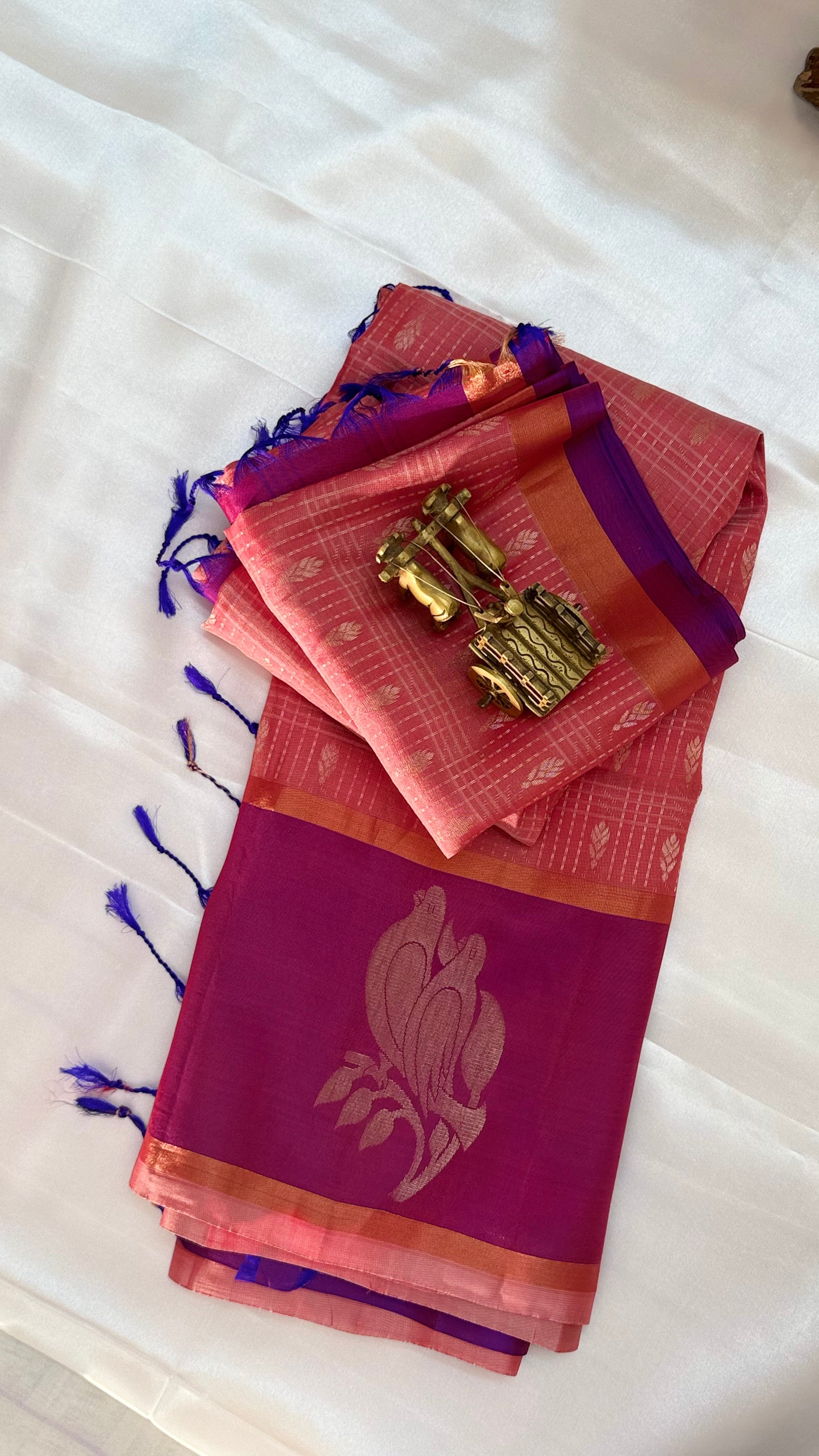 Kanchi Pattu Saree with Peach colour body and Purple border
