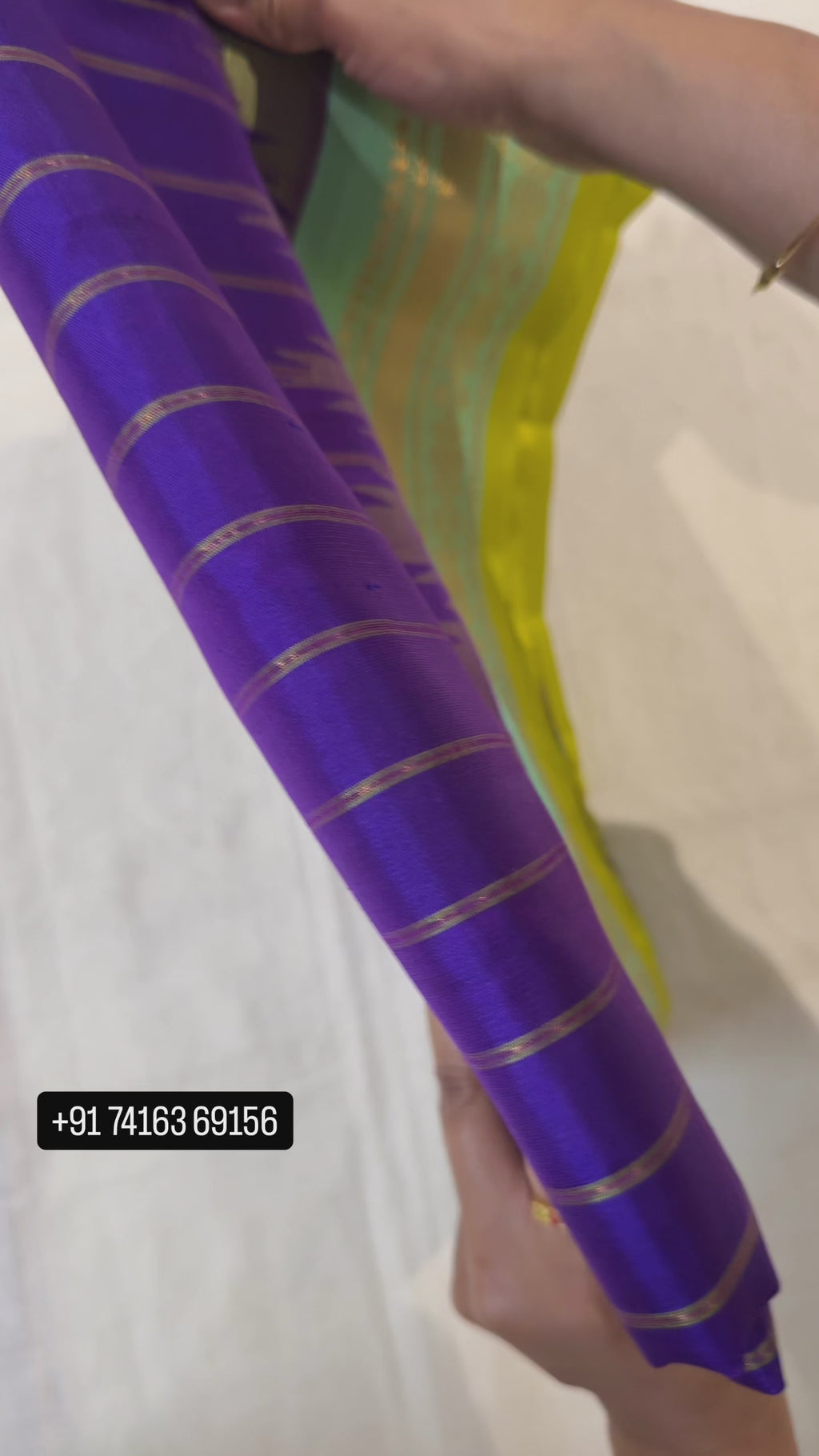 Purple Handloom Gadwal Pattu Saree With a Green Stripe Border
